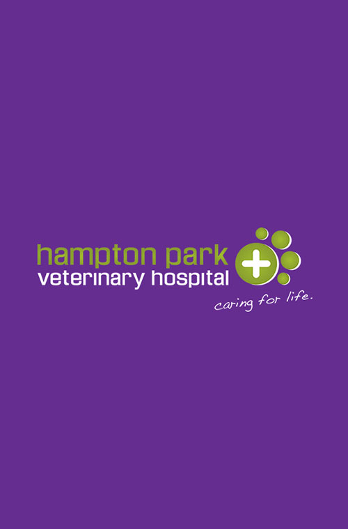 Logo of Hampton Park Veterinary Hospital featuring a green cross and paw print with the tagline "caring for life."